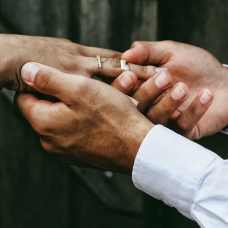 man holding person's hands